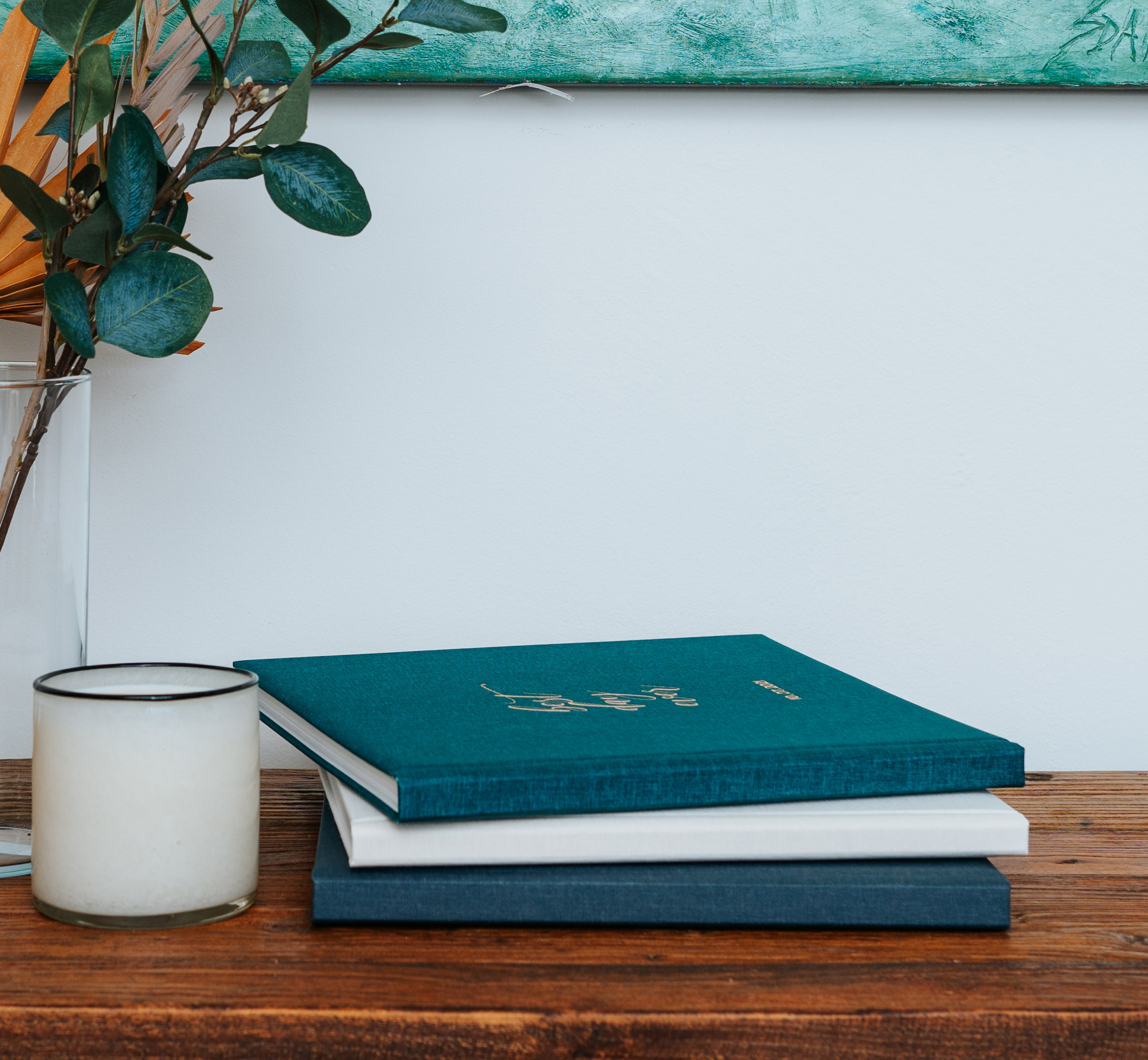 custom photo book laying on wooden table